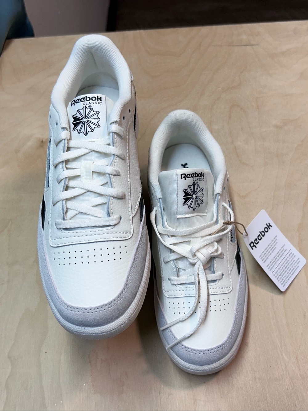 Reebok Kids White Sneakers with Black Logo Accents